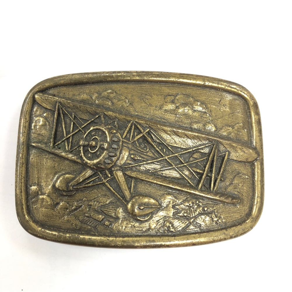 VTG AVON Belt Buckle Embossed Biplane Flight Aviation Brass Propeller 1970